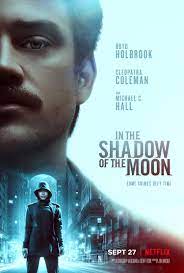 IN THE SHADOW OF THE MOON